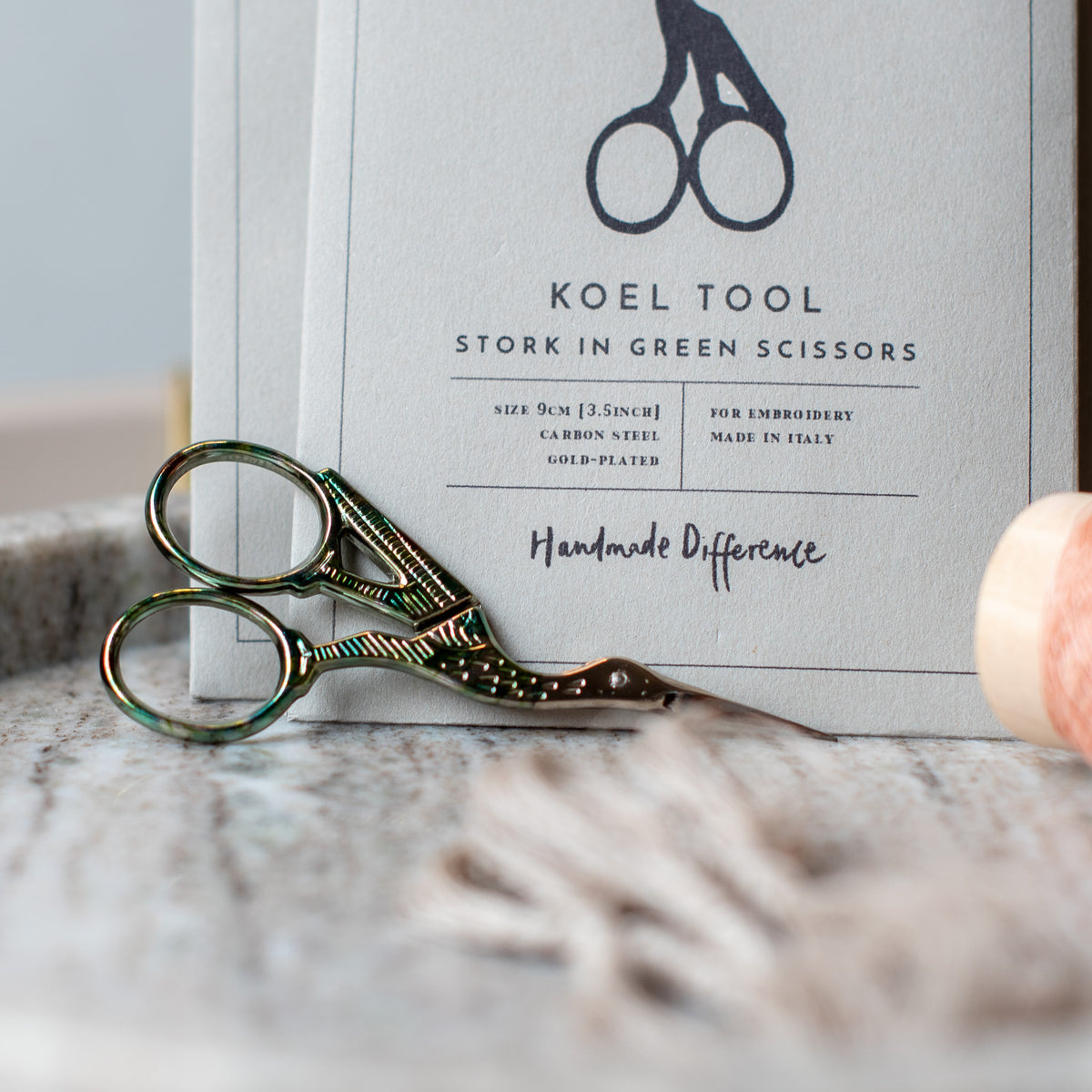 Stork in Green Scissors